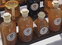 fire cider with ACV, local raw honey, lemon, ginger, turmeric, horseradish, pepper