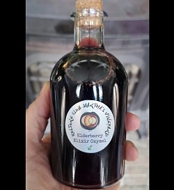 Elderberry Elixir with ACV, local raw honey, ginger, echinacea, chaga